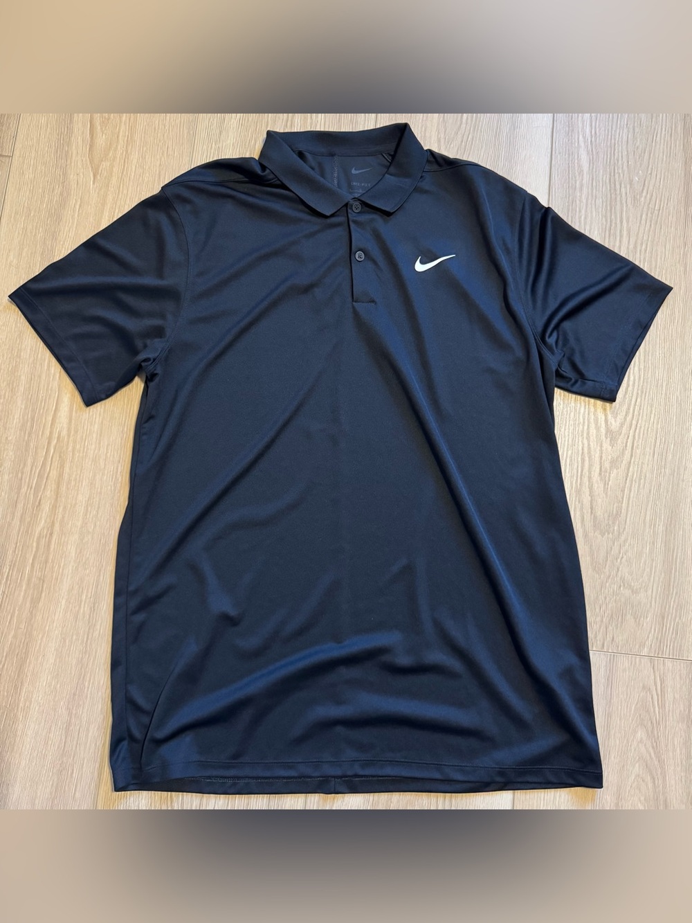 Nike Black Polo Shirt with White Swoosh